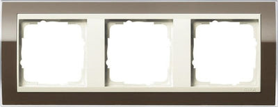 Gira Event Clear Brown afwerkingsframes met glanzend crèmewit tussenframe in bruin met